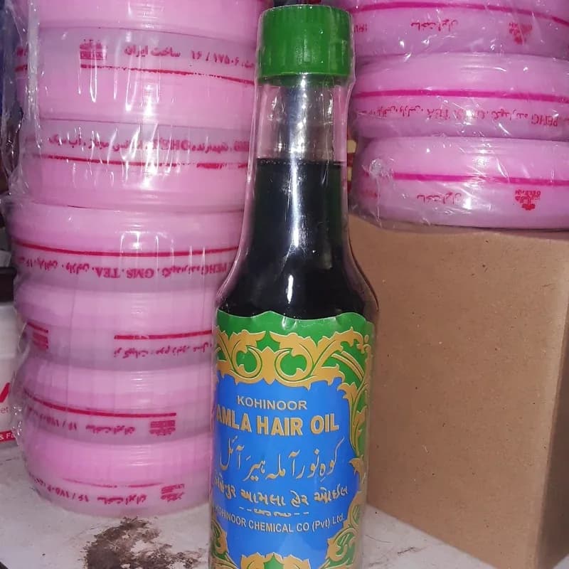 روغن مو هندی برای تقویت مو ریشه مو نرم کنندگی مو | رژینا روغن مو هندی برای تقویت مو ریشه مو نرم کنندگی مو